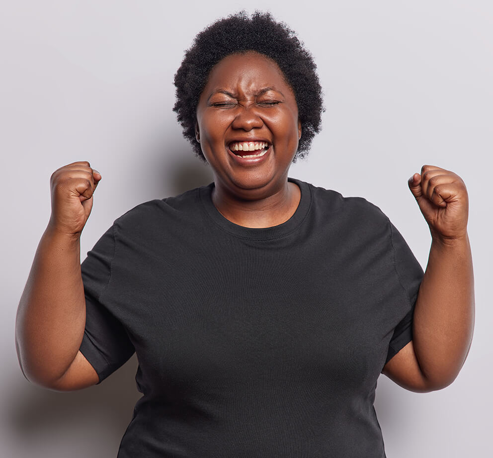 overjoyed-plump-woman-with-curly-hair-ecstatically-2025-01-23-13-52-30-utc (1)
